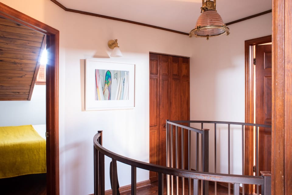 Left is middle bedroom. Folding doors lead to laundry room. Right is primary