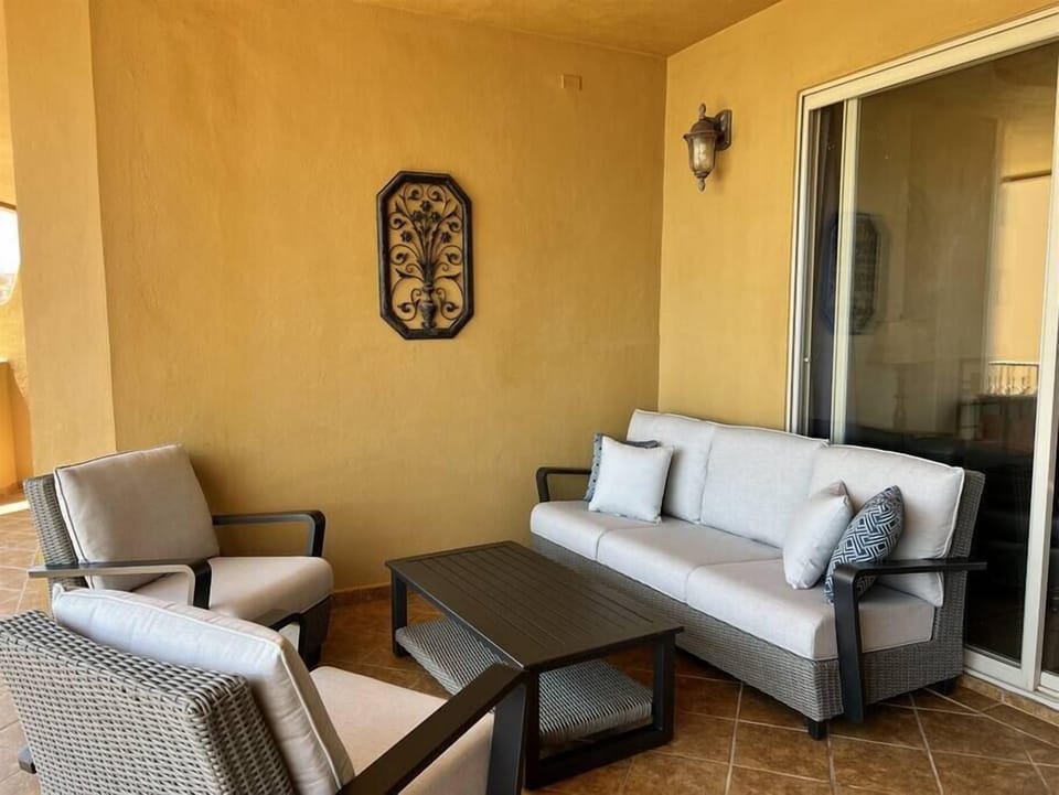 Enjoy the new patio furniture on the balcony!