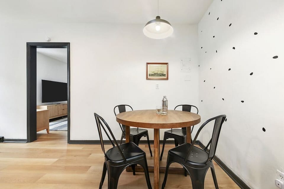 Enjoy meals together at our charming dining table.