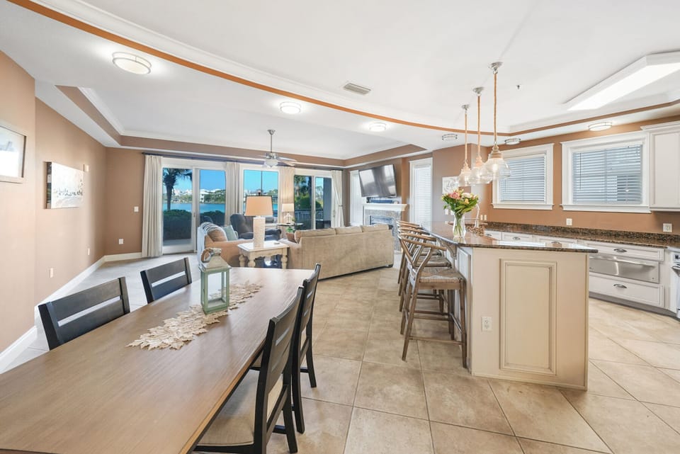 Your open-concept living space flows seamlessly from kitchen to dining to living room, perfect for gathering with family and friends.