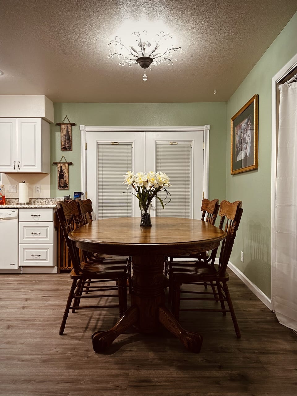 The kitchen table seats six comfortably.