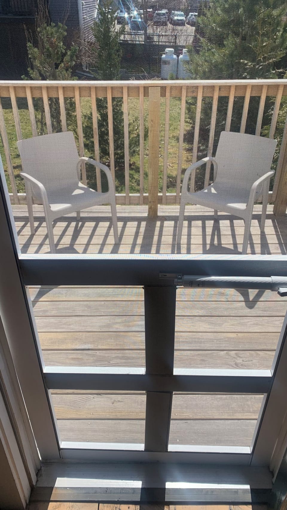 Screened door for air flow.. out to deck for coffee or cocktails