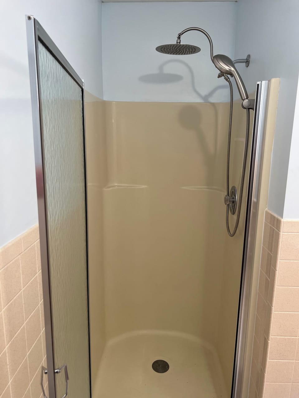 Rain shower fixture and wand.