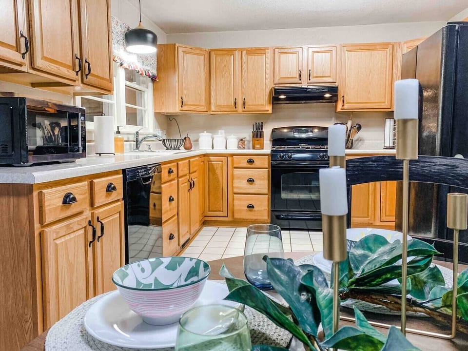 GATHER: Fully stocked kitchen with plenty of serving dishes, pots & pans, and coffee supplies.