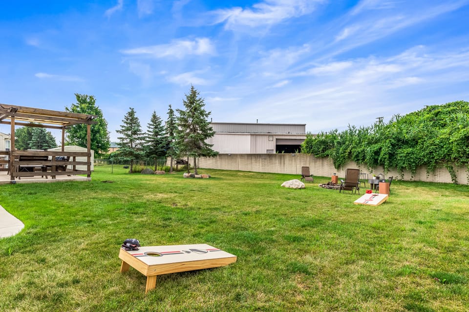 Spacious backyard is fully fenced and has plenty of seating for everyone
