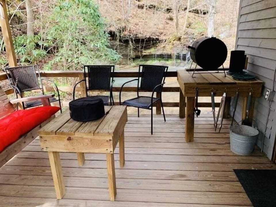 Porch overlooks the small pond. 
 Charcoal grill provided. 
(BYO Charcoal)
