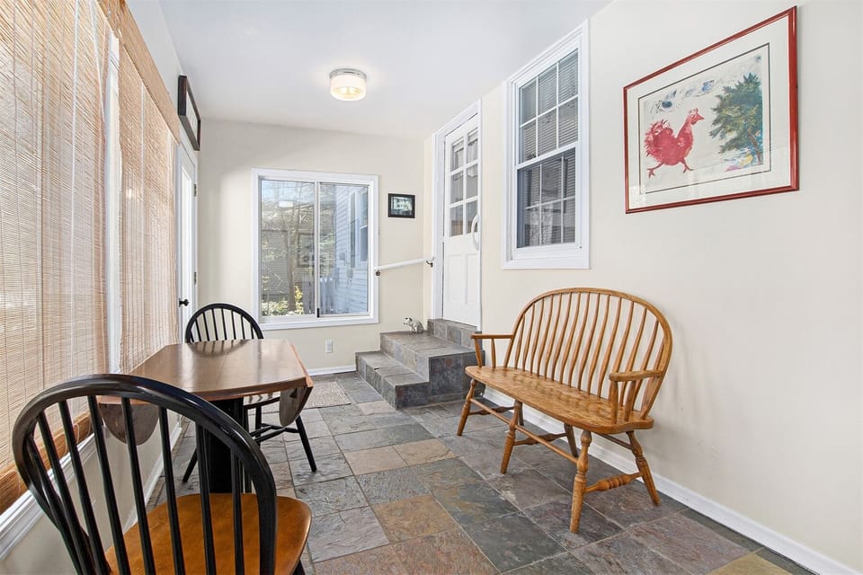 Beautiful entryway to Martha`s Cottage is a great place to leave your shoes and toys from the beach