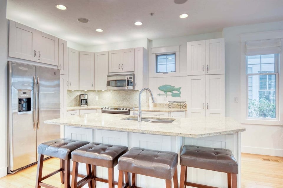 Fully equipped kitchen with granite counters and stainless appliances