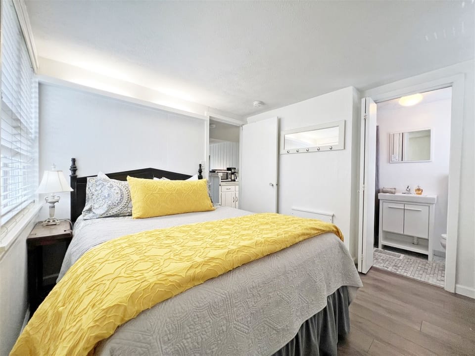 Access to the bathroom is through the bedroom