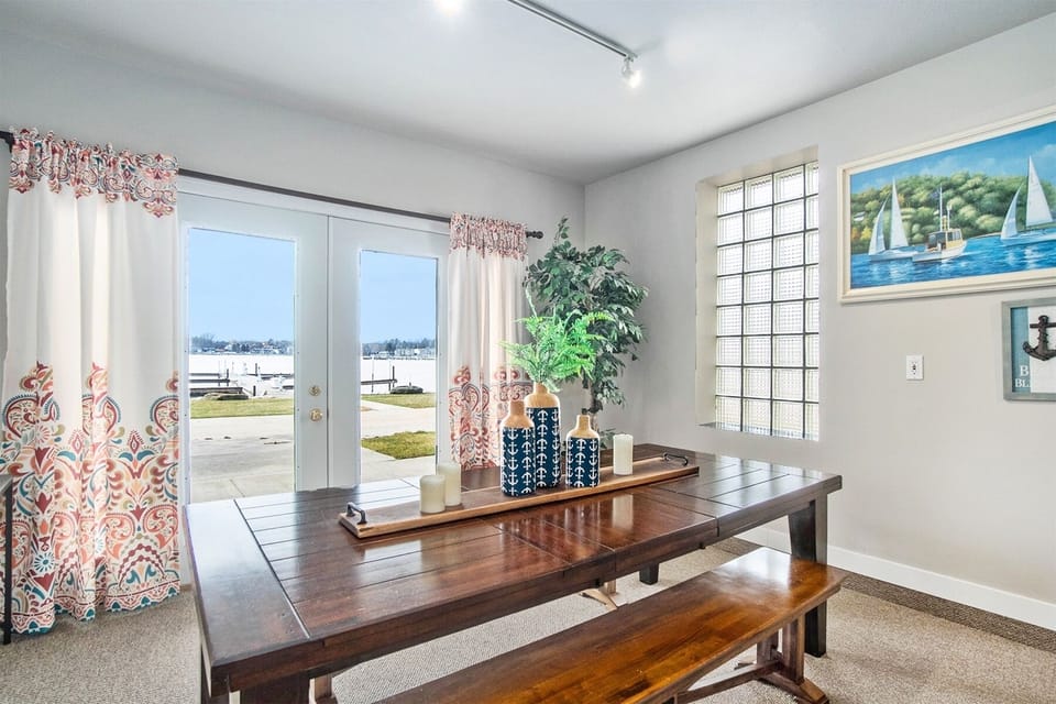 Gaze at the harbor while playing a competitive game of cards