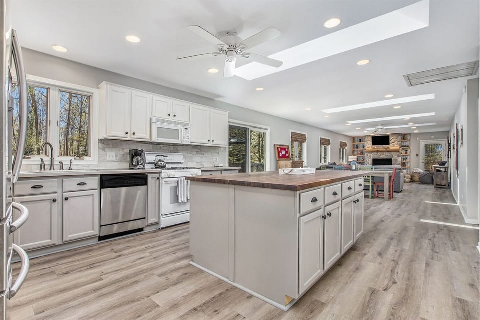 Updated fully equipped kitchen has everything you need for a meal at home
