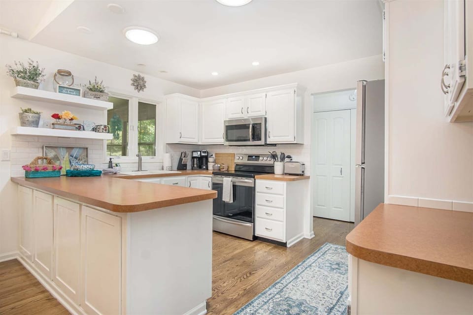 The kitchen is bright and has plenty of space to cook a nice meal