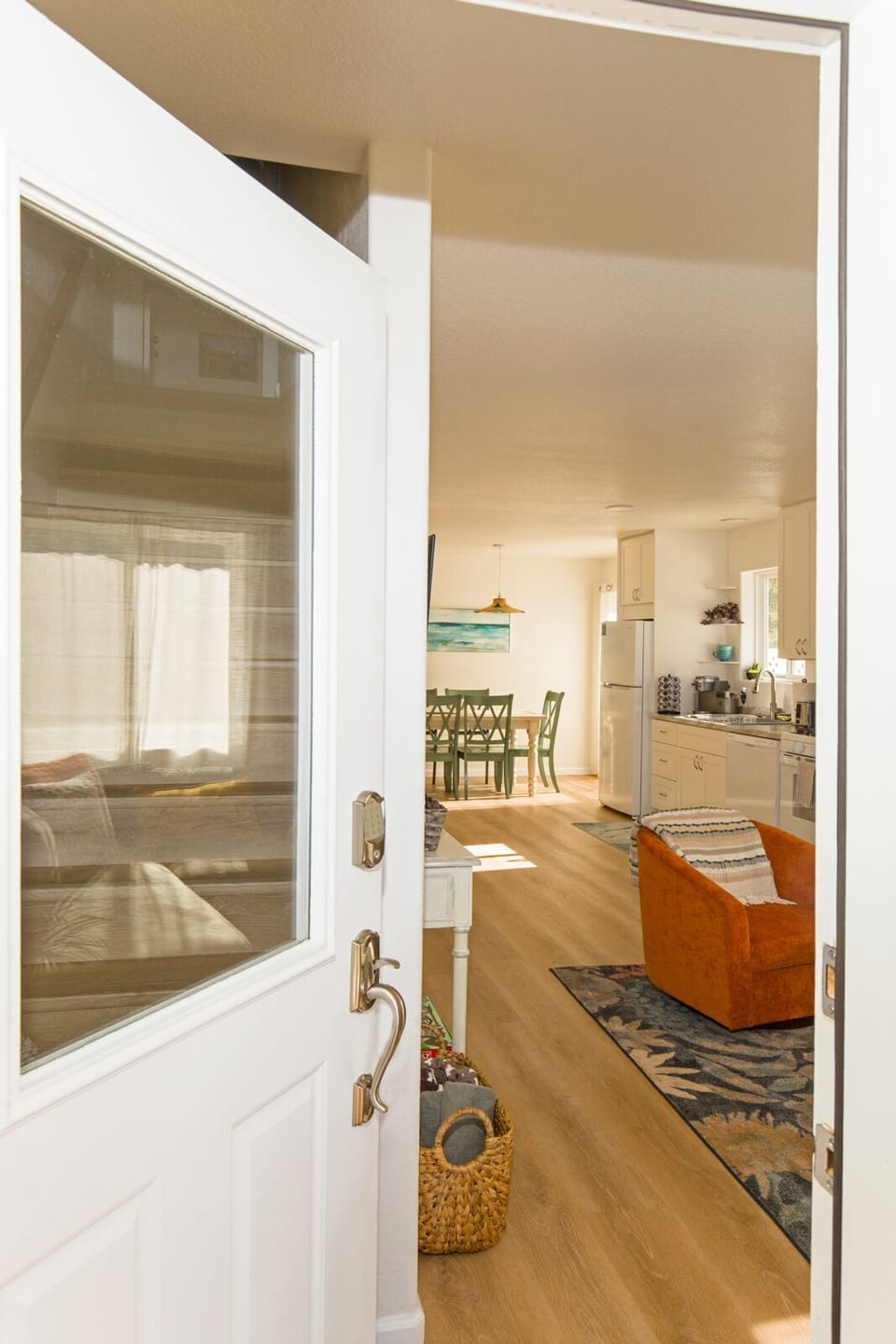 Walk into an open downstairs area of Unit 1