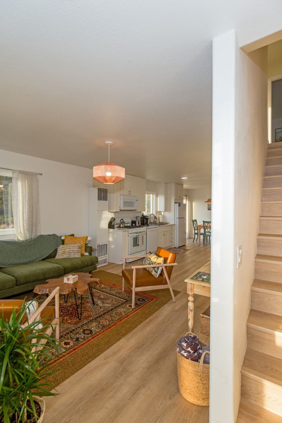 Walk into an open downstairs area of Unit 2