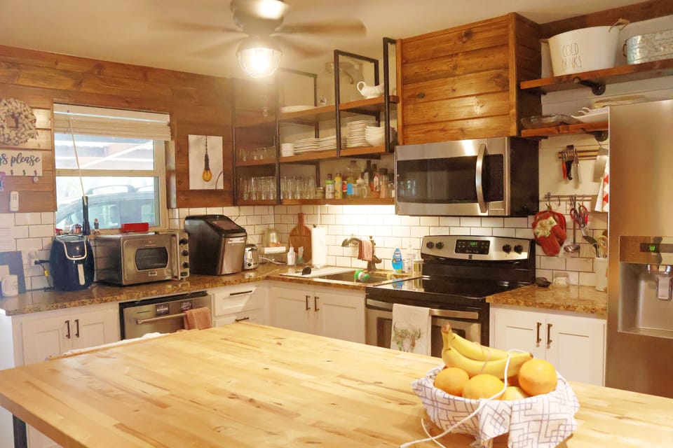 open concept kitchen / dining / living 