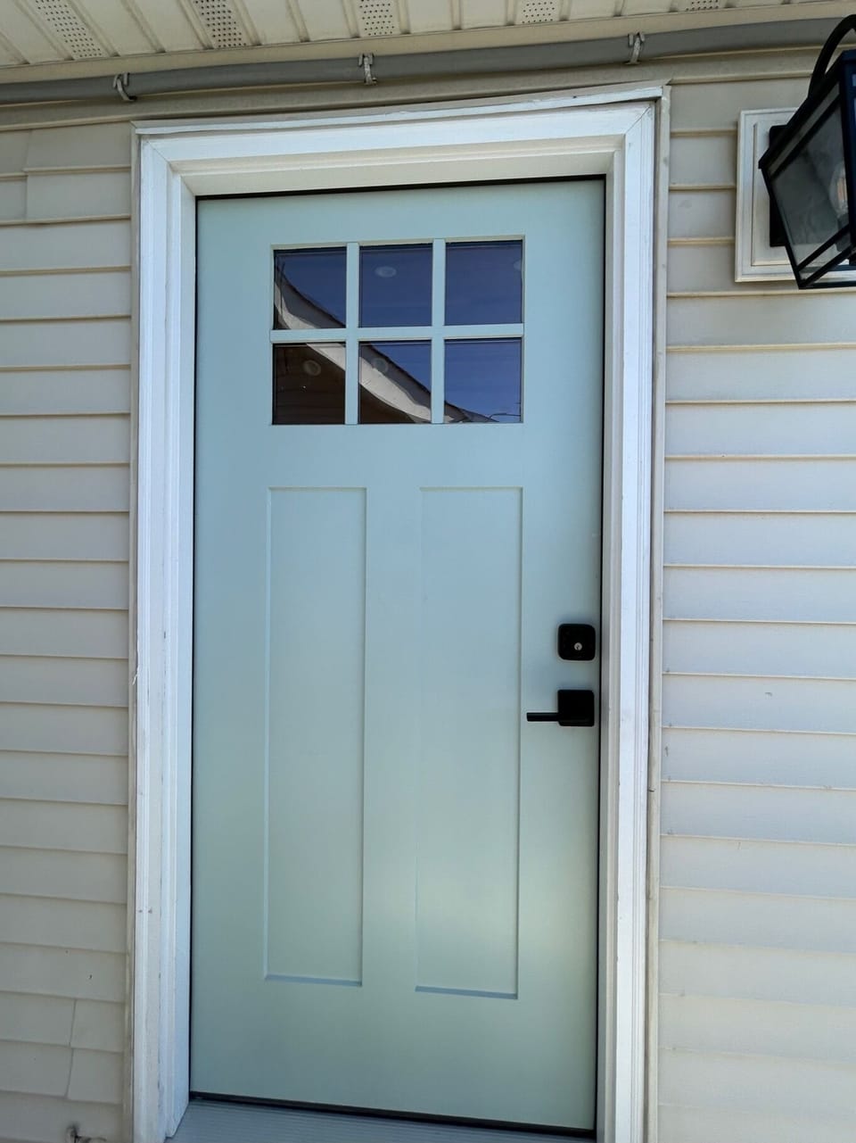 Front door light has automatic sensor for darkness.