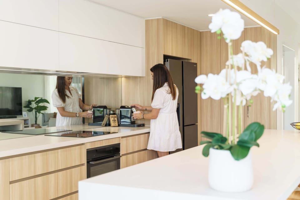 Modern kitchen features quality appliances throughout