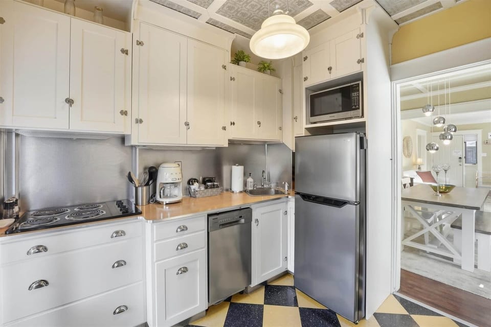 charming little kitchen with all the essentials. stovetop available (no oven).