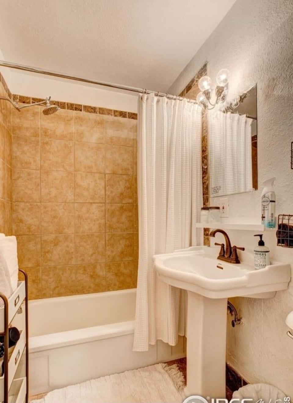Bath equipt with towels, soap, makeup towels, blow dryer, shampoo & conditioner