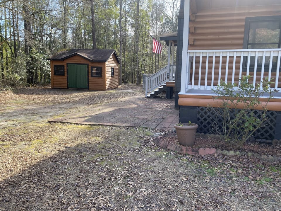 Side entrance and shed