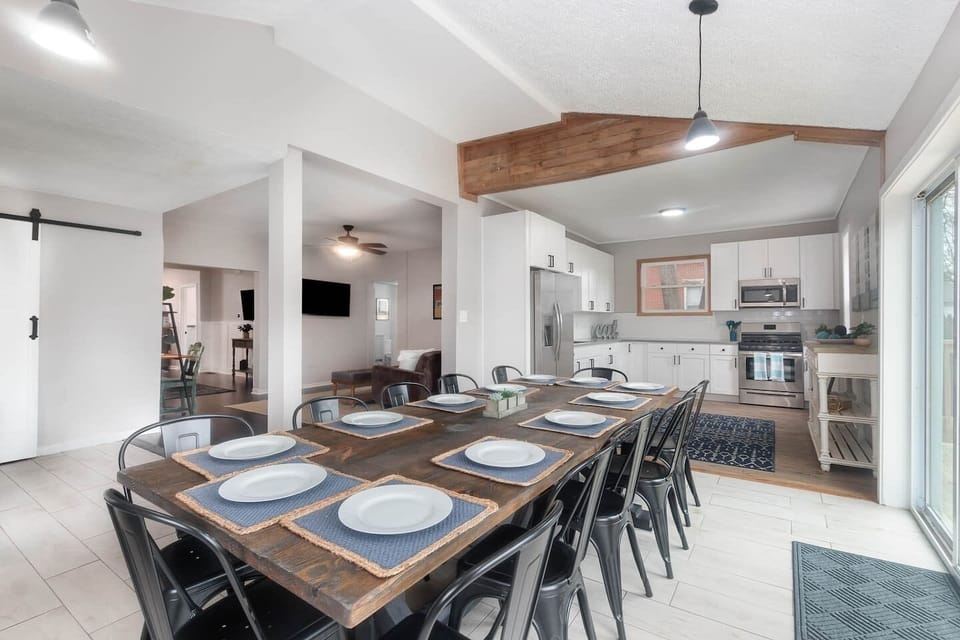 Gather with friends or family to enjoy a meal around the table! (Seats 12)