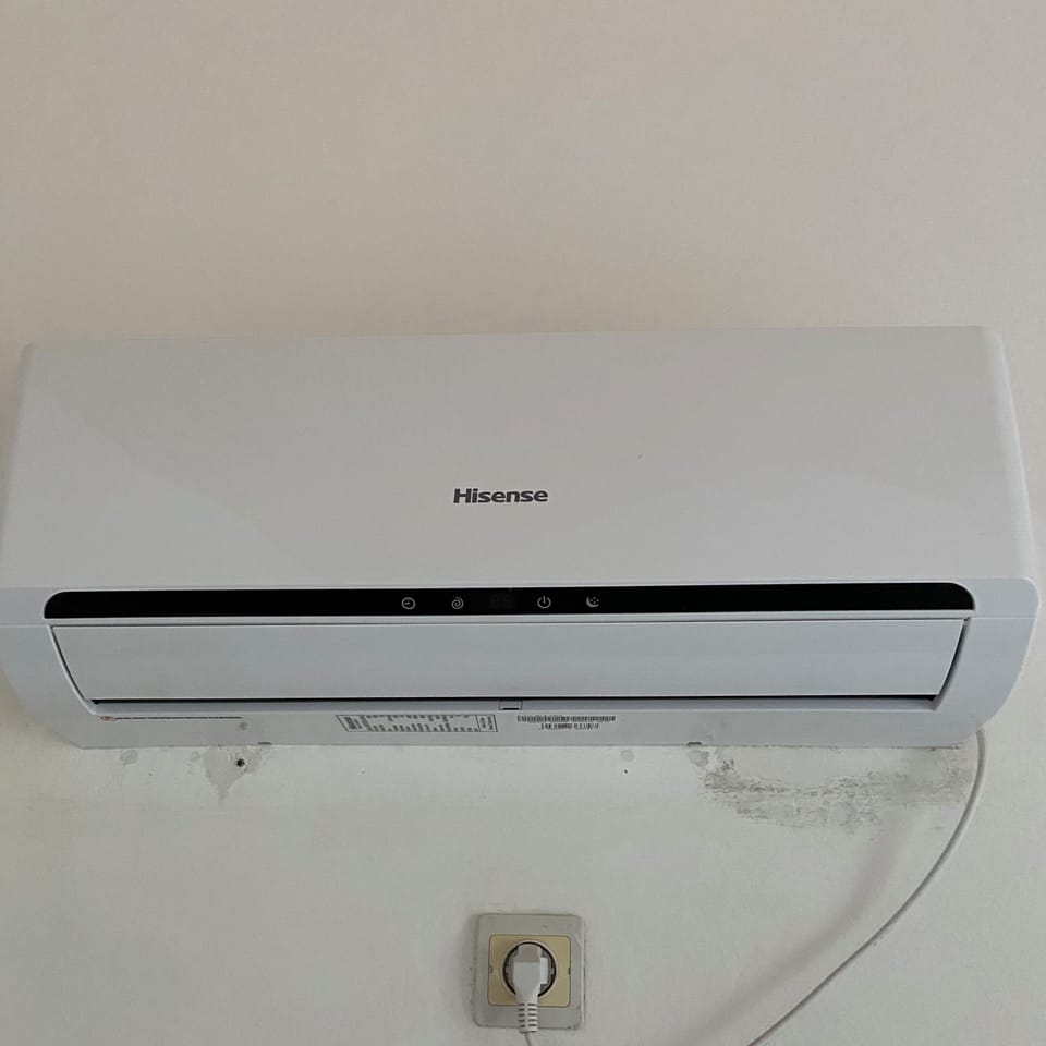 AC units in both the living room and the bedroom 