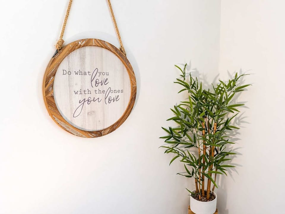 Elegant wall décor adds charm and character to the space, creating a warm and inviting atmosphere.