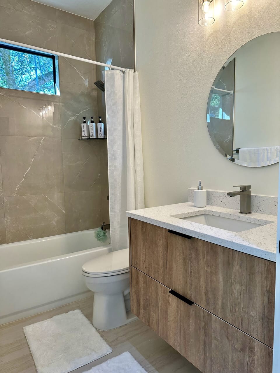 Hallway bathroom with tub shower 