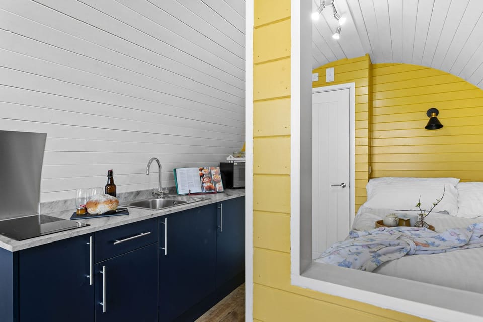 Double bed and countertop with cooking facilities - Honeycrisp Pod