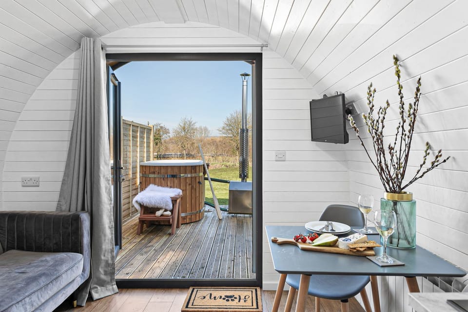 Views outside to the river from the cosy bed -Bramley Glamping Pod