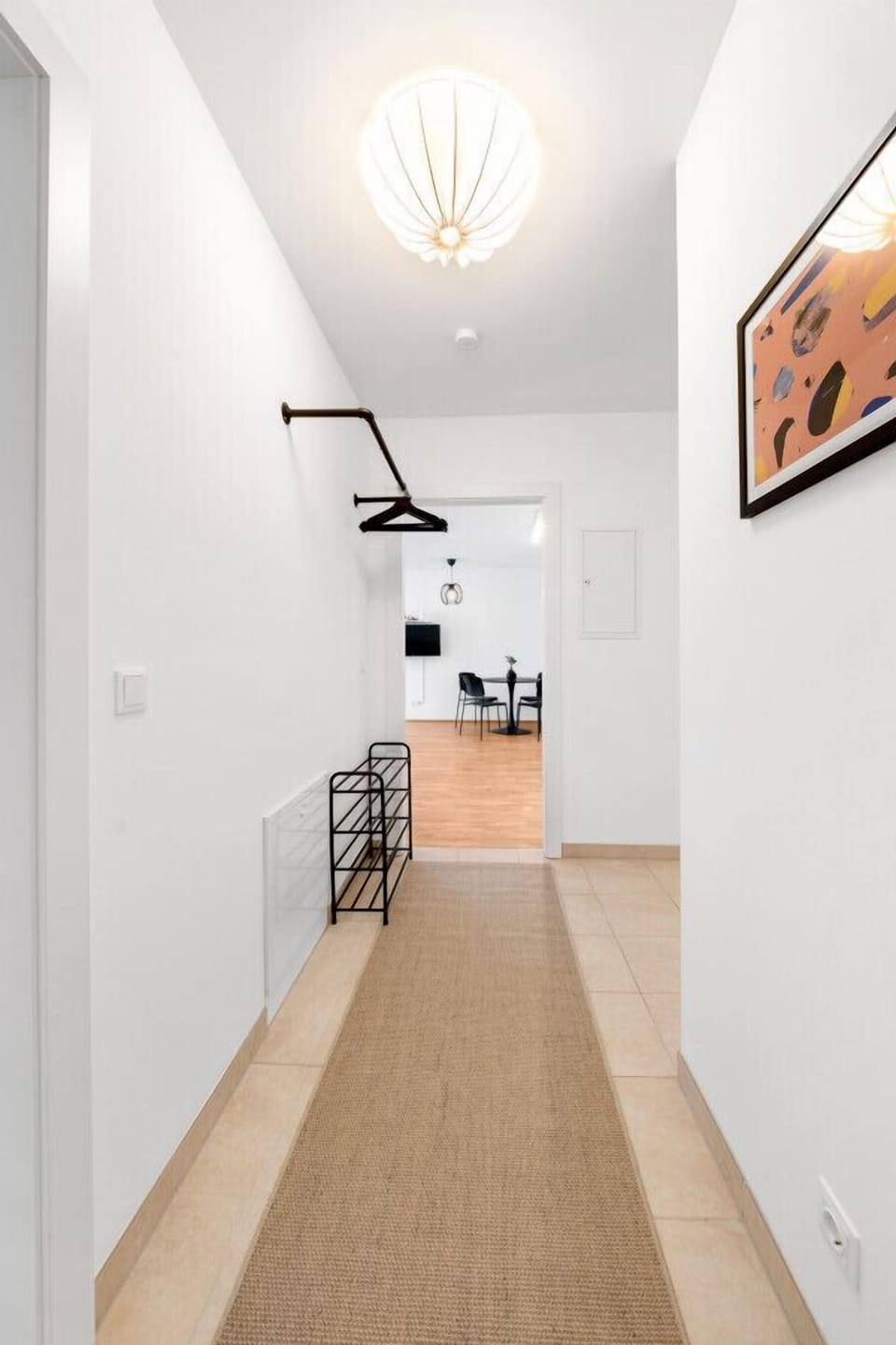 a designed corner in the hallway to enter the colorful rooms