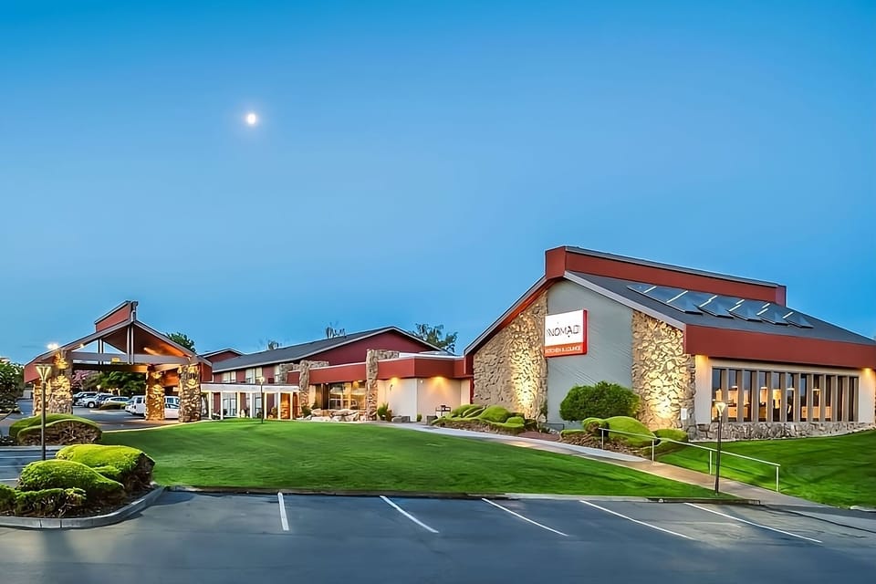 Arrive to a warmly lit exterior with easy, welcoming access.