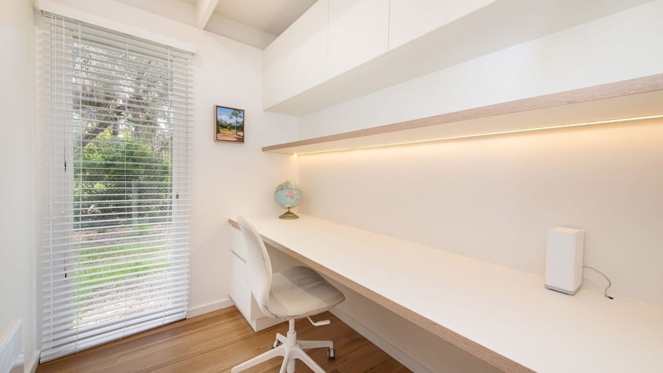 Step into our dedicated workspace, where productivity meets comfort in a setting designed to inspire  you.