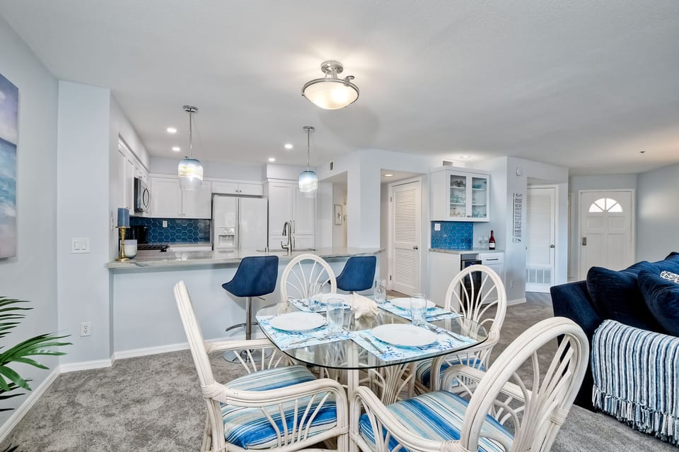 Open floor concept of living, dining, and kitchen areas