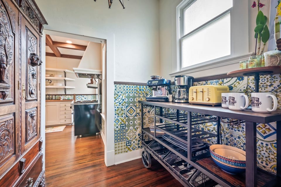 Wonderful butler pantry coffee cart and serving area.