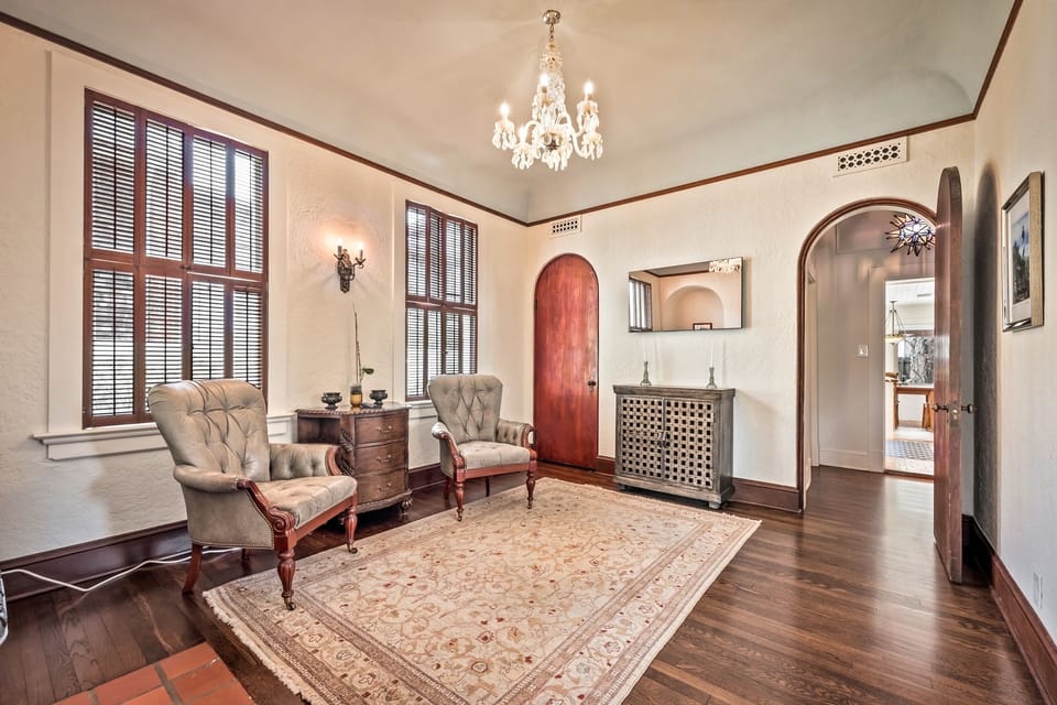 Sitting room adjacent to dining room. After dinner drink or pop on the mirror tv