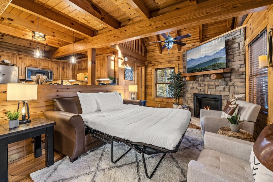 Main level living room with pull out queen sofa bed