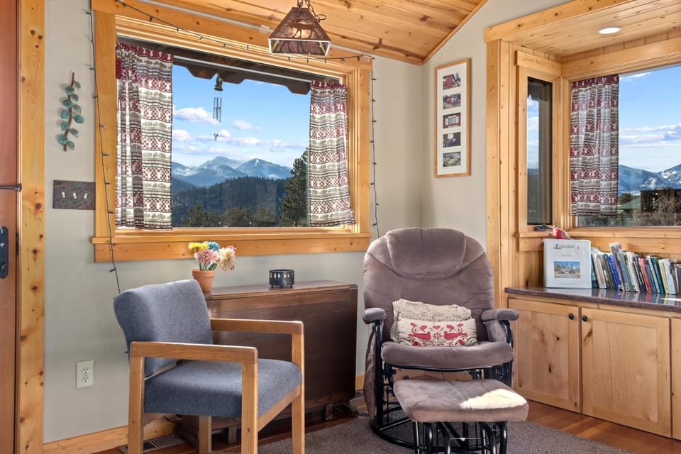Cozy reading nook with stunning mountain views