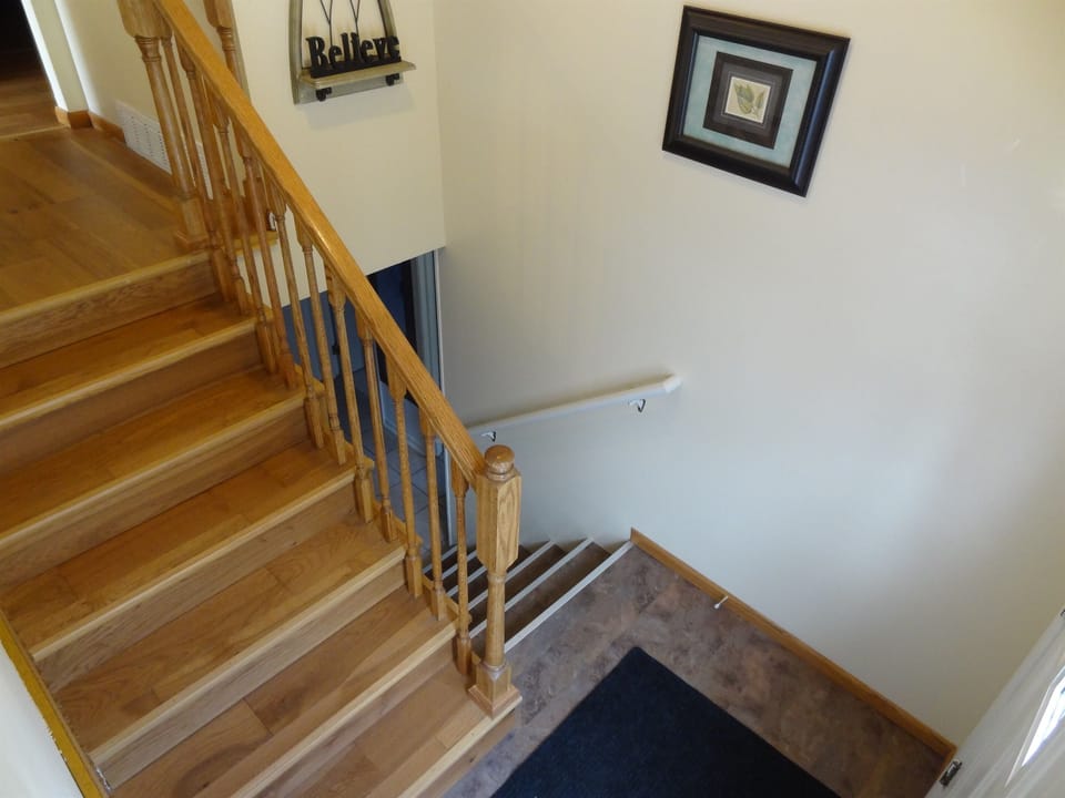 Steps needed to go to the 3 bedrooms and Kitchen. Full sized couch downstairs