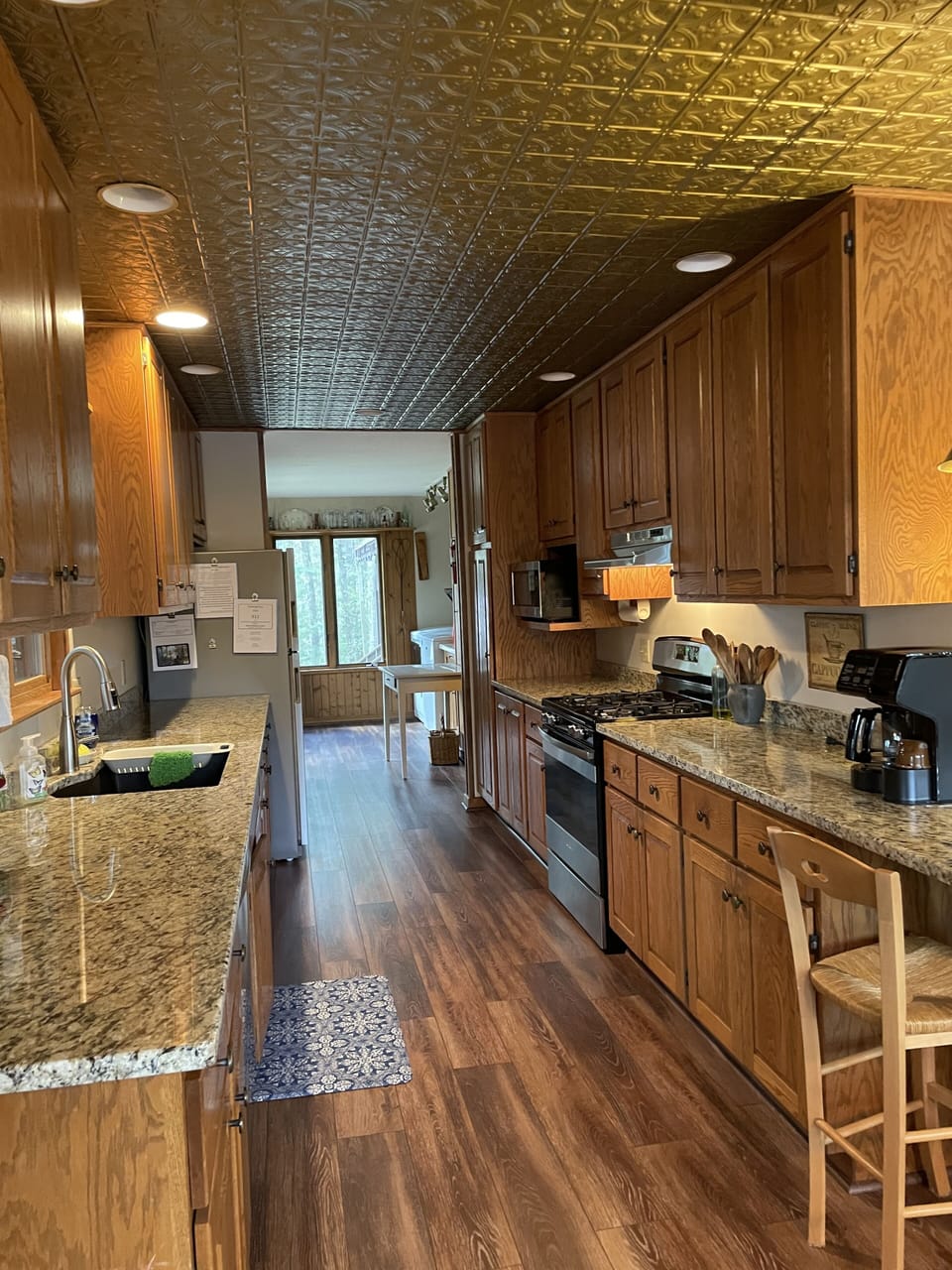 Fully equipped galley kitchen. Dishwasher. Microwave. Kitchen Aid. Popcorn Maker