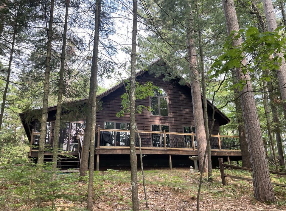 View of the cozy cottage from the lake.