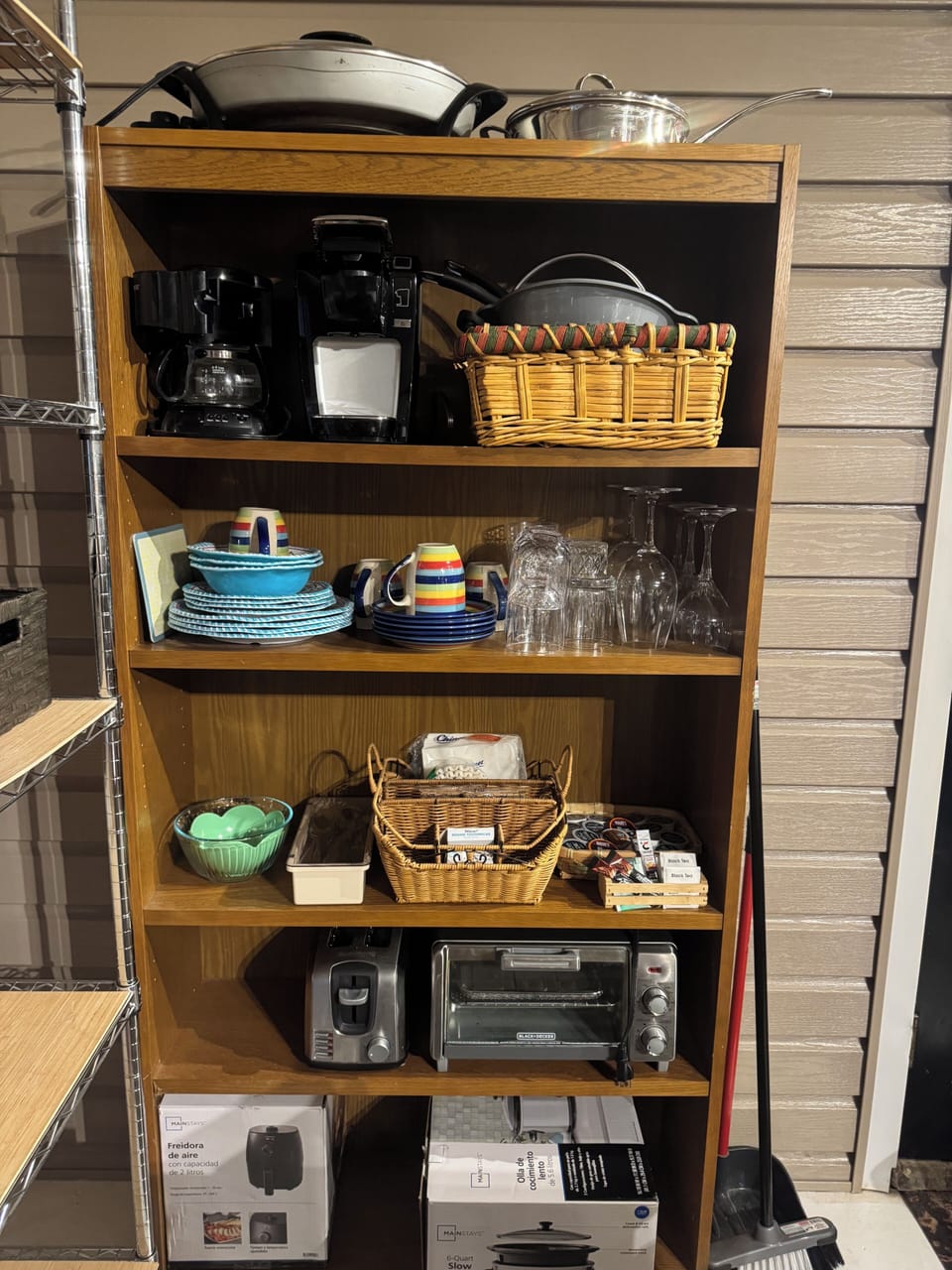 There are small appliances, plates and flatware available for your convenience.