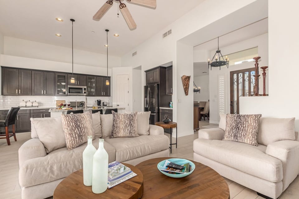 Cozy and Homelike Living Space featuring flat screen SMART TV, Indoor Fireplace and Designer Furnishings.