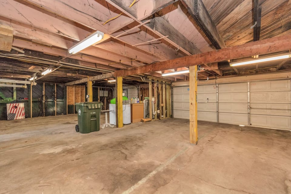 Garage under the Building with vehicle max height of 65 in.