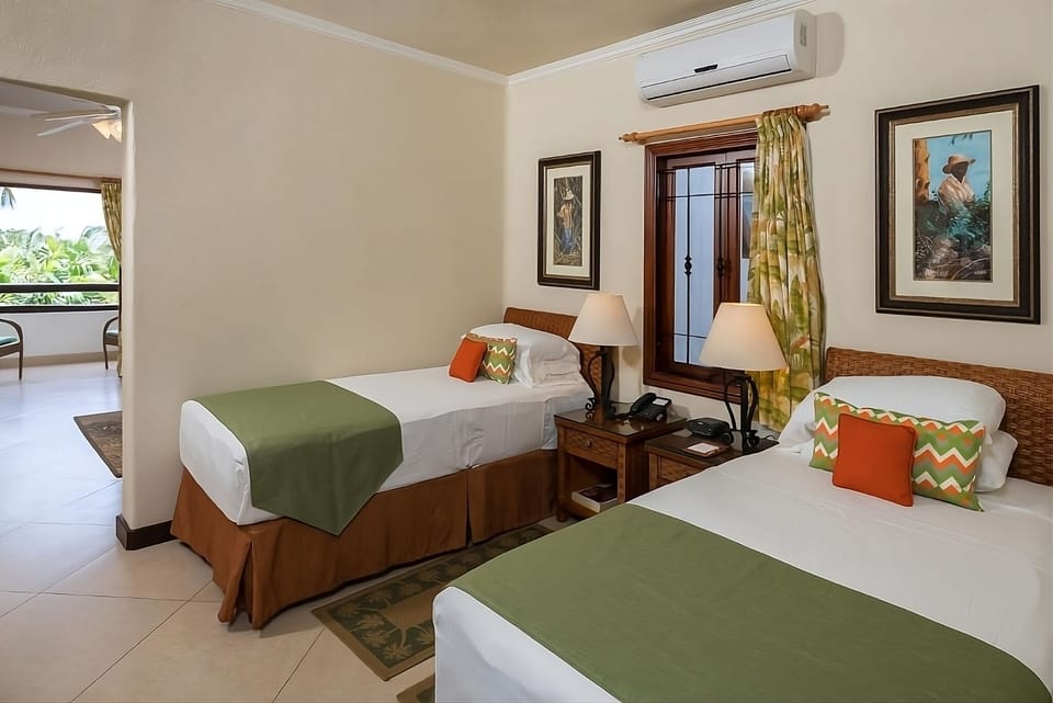 Unit with Twin beds. Exact unit will be assigned upon arrival. Views, colors and decor may vary.