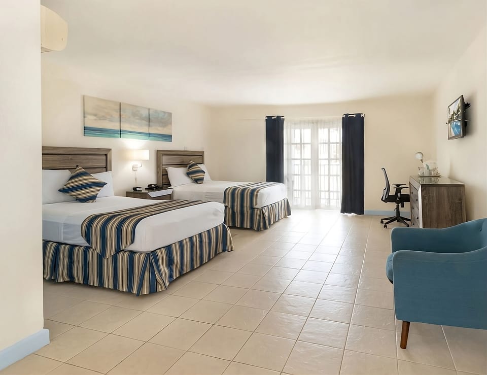 Unit with 2 single beds.  Exact unit will be assigned upon arrival. Views, colors and decor may vary.