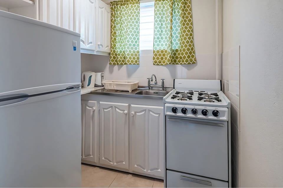 Unit with fully equipped kitchen
