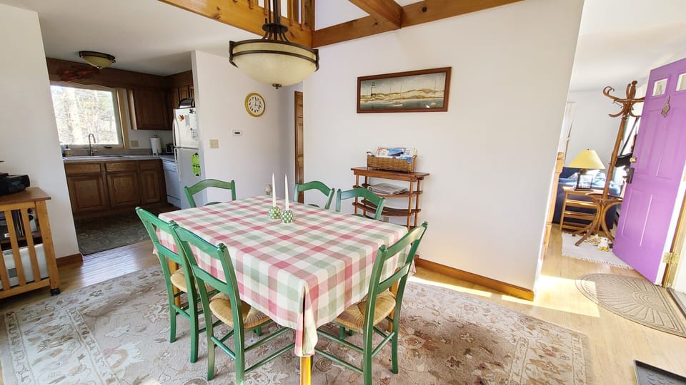 Dining room with kitchen beyond