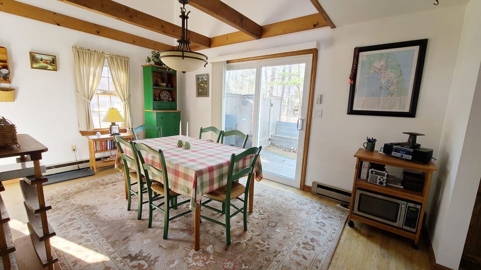 Dining room with slider to deck