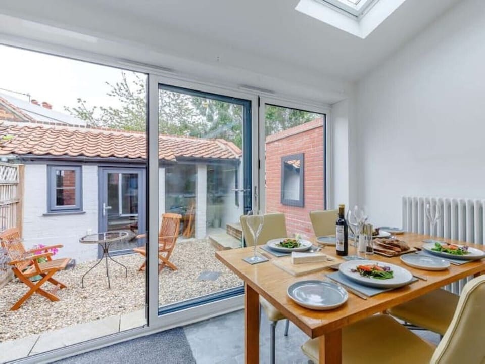 Bifold doors opening onto small enclosed courtyard